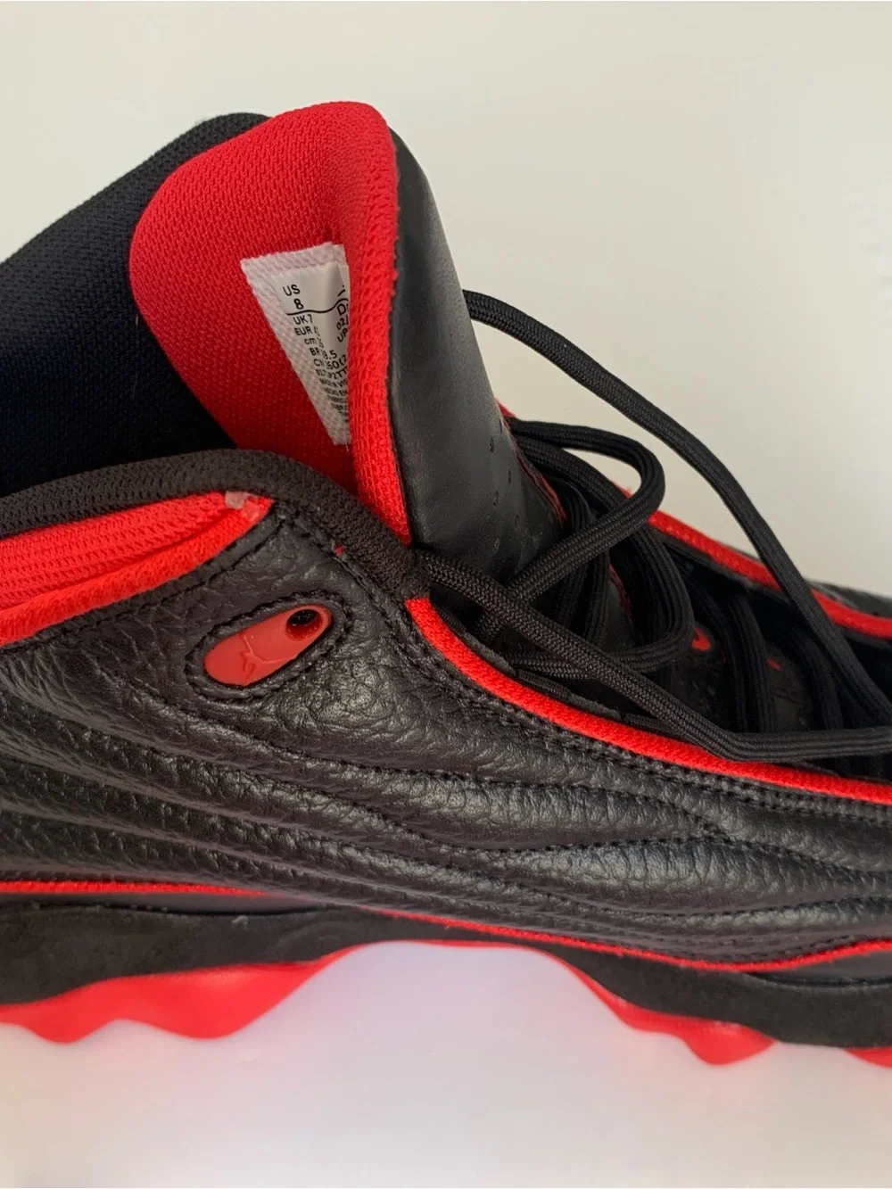 Jordan High-Top Sneakers in Black and Red